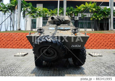 PORT DICKSON, MALAYSIA -MAY 08, 2016: Old army armor vehicle and tanks restored and display for public at Malaysia Army Museum or Muzium Tentera Darat in Port Dickson, Negeri Sembilan, Malaysia. PORT DICKSON, MALAYSIA -MAY 08, 2016: Old army armor vehicle and tanks restored and display for public at Malaysia Army Museum or Muzium Tentera Darat in Port Dickson, Negeri Sembilan, Malaysia. 86341995