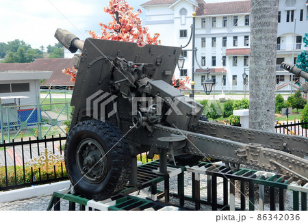PORT DICKSON, MALAYSIA -MAY 08, 2016: Old war cannon restored and display for public at Malaysia Army Museum or Muzium Tentera Darat in Port Dickson, Negeri Sembilan, Malaysia. PORT DICKSON, MALAYSIA -MAY 08, 2016: Old war cannon restored and display for public at Malaysia Army Museum or Muzium Tentera Darat in Port Dickson, Negeri Sembilan, Malaysia. 86342036