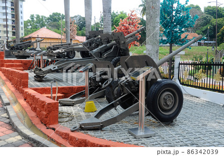 PORT DICKSON, MALAYSIA -MAY 08, 2016: Old war cannon restored and display for public at Malaysia Army Museum or Muzium Tentera Darat in Port Dickson, Negeri Sembilan, Malaysia. 86342039