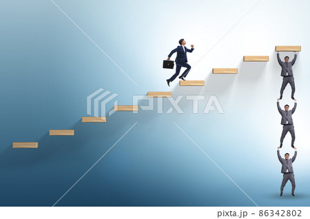 Teamwork concept with businessmen helping each other 86342802