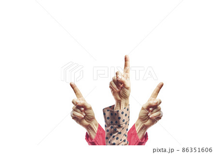 Human hands with finger pointing up. Hands of women touching or pointing to something isolated on white background Human hands with finger pointing up. Hands of women touching or pointing to something isolated on white background 86351606