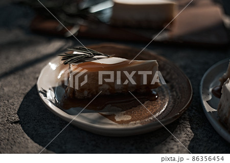 Slice of cheesecake with caramel sauce Slice of cheesecake with caramel sauce 86356454