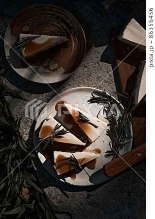 Slice of cheesecake with caramel sauce Slice of cheesecake with caramel sauce 86356456