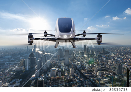 Autonomous driverless aerial vehicle flying on city background, Future transportation with 5G technology concept Autonomous driverless aerial vehicle flying on city background, Future transportation with 5G technology concept 86356753