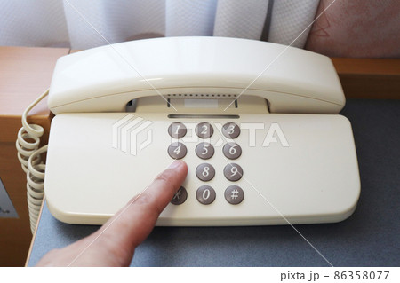 電話をかける 86358077