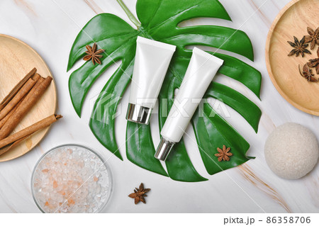 Natural skincare beauty product, Cosmetic bottle containers packaging with green nature leaves, Natural skincare beauty product, Cosmetic bottle containers packaging with green nature leaves, 86358706