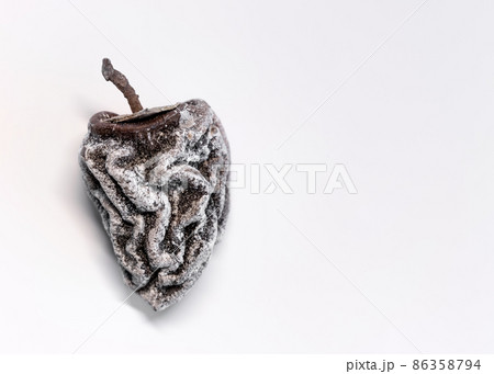 Dried persimmon on a white background. Healthy diet Dried persimmon on a white background. Healthy diet 86358794