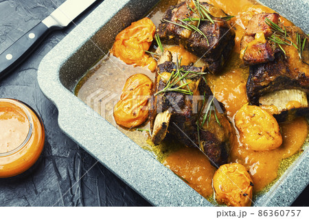 Beef ribs roasted in fruit. Beef ribs roasted in fruit. 86360757