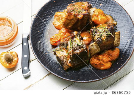 Pork stewed in fruit gravy Pork stewed in fruit gravy 86360759