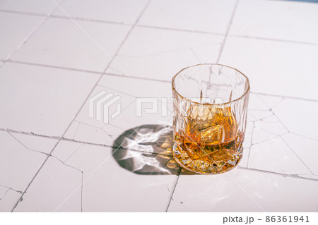Whiskey with ice in glasses Whiskey with ice in glasses 86361941