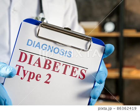 Doctor shows diabetes type 2 diagnosis in the medical form. 86362419