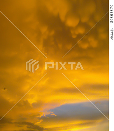 Magical yellow Sunset, cloudy sky and light reflections Magical yellow Sunset, cloudy sky and light reflections 86363370
