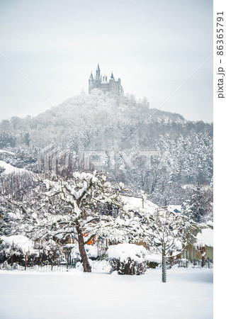 Castle Hohenzollern in Germany by snowy winter Castle Hohenzollern in Germany by snowy winter 86365791