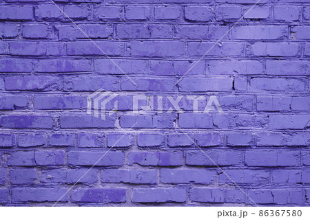 Fragment of street brick wall toned in trendy color of the 2022 year Fragment of street brick wall toned in trendy color of the 2022 year 86367580