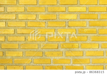 Yellow brick wall texture with vintage style pattern for background and design art work. Yellow brick wall texture with vintage style pattern for background and design art work. 86368315
