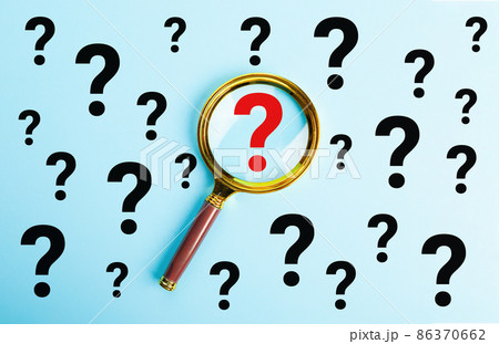 Magnifying glass with question mark symbol on blue background. The concept of creative idea and 86370662