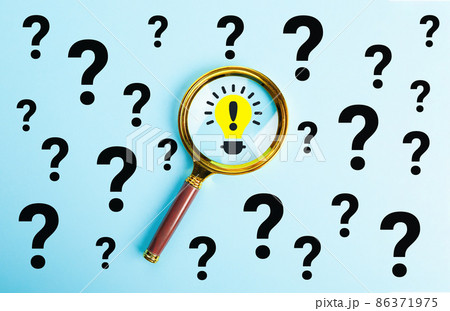 Magnifying glass with bulb icon and question mark symbol on blue background. Creative idea or Magnifying glass with bulb icon and question mark symbol on blue background. Creative idea or 86371975