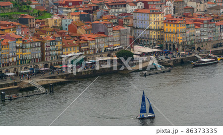 Porto, Portugal - April 2018: Panoramic view of Old Porto Oporto city and Ribeira over Douro river from Vila Nova de Gaia, Portugal 86373335
