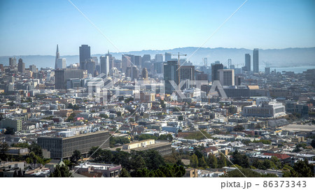 San Francisco, California, USA - August 2014: San Francisco downtown cityscape with skyscrapers and high buildings San Francisco, California, USA - August 2014: San Francisco downtown cityscape with skyscrapers and high buildings 86373343