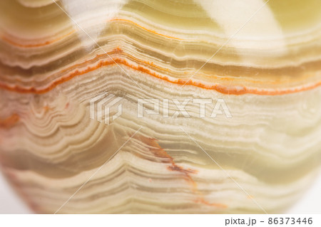 The texture of green onyx with brown veins. 86373446