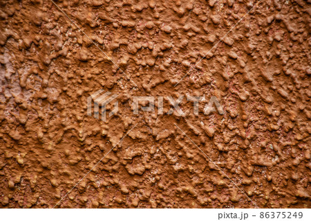 Plaster background, brown textured plaster wall, copy space, text space Plaster background, brown textured plaster wall, copy space, text space 86375249