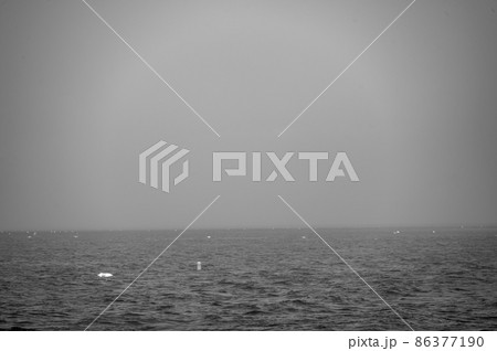 Lobster trap buoy floating on a choppy ocean in the Atlantic Ocean 86377190