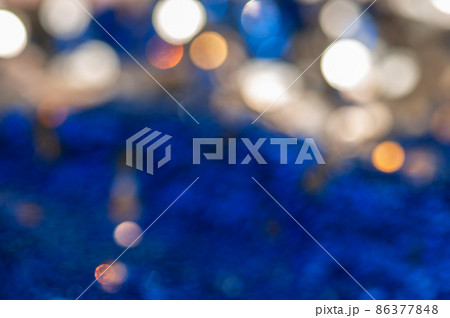 Blue defocused abstract bokeh lights background. 86377848