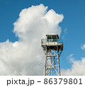 Wildfire lookout tower with big clouds on the background. 86379801