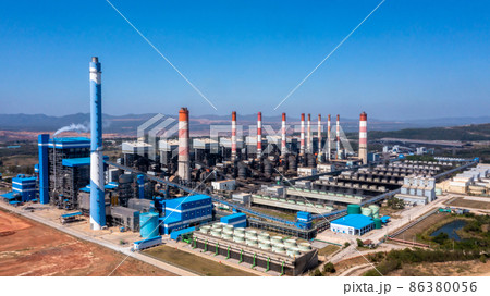 Aerial view Coal-fired power plants with blue sky background, coal-fired power station, Gas turbine electrical power plant power for factory energy, Power plant for industrial estate. 86380056