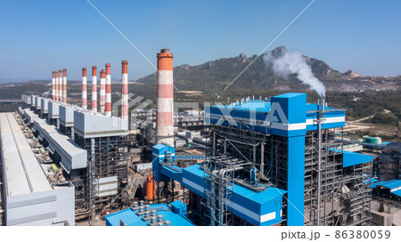 Aerial view Coal-fired power plants with blue sky background, coal-fired power station, Gas turbine electrical power plant power for factory energy, Power plant for industrial estate. 86380059