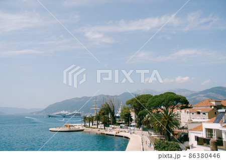 Modern club houses in the resort of Porto. Montenegro Modern club houses in the resort of Porto. Montenegro 86380446