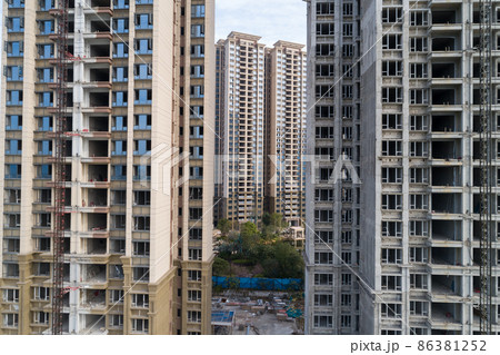 Aerial view of multistory apartment construction site in China 86381252