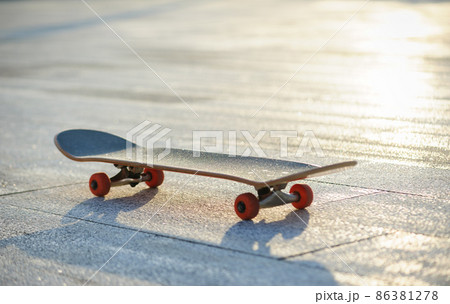 Skateboard ready for riding at park Skateboard ready for riding at park 86381278