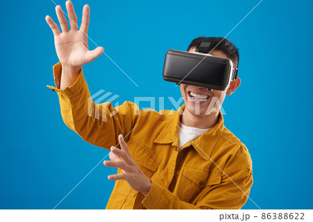 Man Enjoying Augmanted Reality 86388622