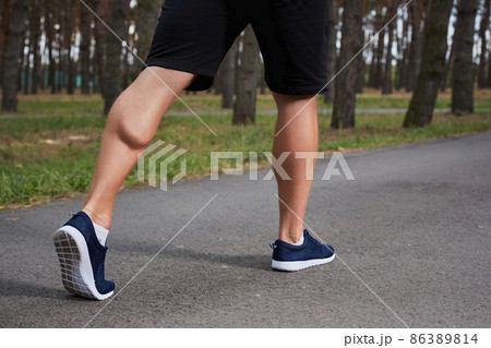 young athlete running in the forest young athlete running in the forest 86389814