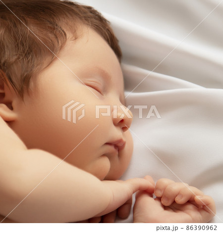 A Baby girl with Smily Face During Sleep. Little A Baby girl with Smily Face During Sleep. Little 86390962
