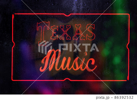 Neon Texas Music Sign in Rainy Window Neon Texas Music Sign in Rainy Window 86392532