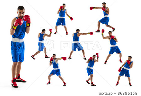 Strong fists. One professional boxer in blue uniform training isolated over white background 86396158