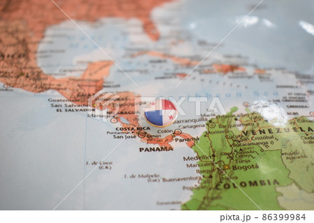 Panama flag drawing pin on the map 86399984
