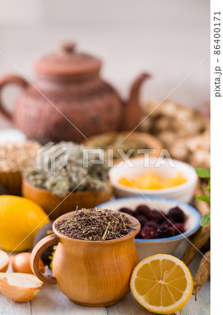 Still life for tea drinking with herbs 86400171
