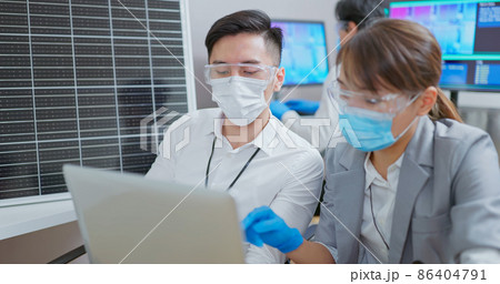 asian engineer with solar panel asian engineer with solar panel 86404791