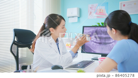 woman at dental clinic woman at dental clinic 86405278