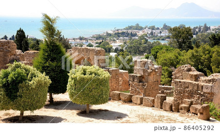 Ruins of the ancient antique city of Carthage and a view of the mountains and the sea in Tunisia 86405292