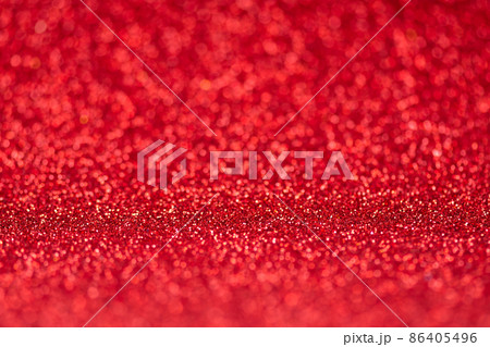Red bokeh background. Red defocused lights background for design. Valentine's Day greeting card. Red bokeh background. Red defocused lights background for design. Valentine's Day greeting card. 86405496