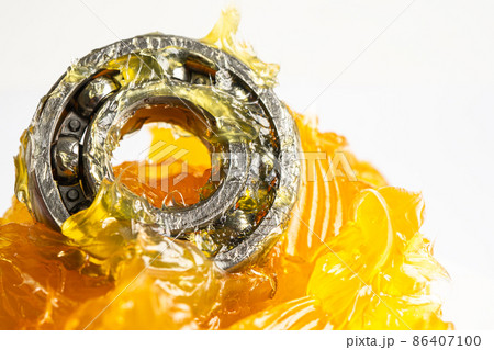 Ball bearing stainless with grease lithium machinery lubrication for automotive and industrial isolated on white background Ball bearing stainless with grease lithium machinery lubrication for automotive and industrial isolated on white background 86407100