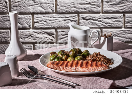 vintage style of table set with grilled salmon vintage style of table set with grilled salmon 86408455