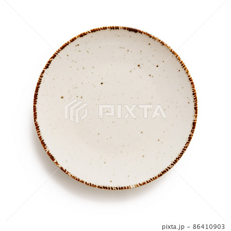 Empty round dinner plate isolated on a white background. Empty round dinner plate isolated on a white background. 86410903