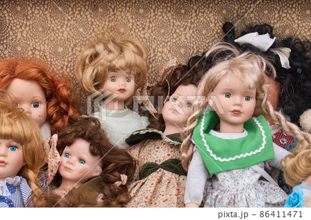 Close-up of retro and vintage dolls. Handmade toy. 86411471