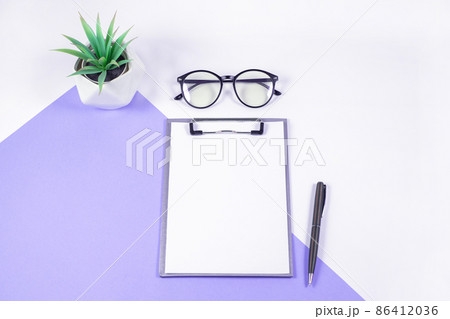 Above photo of empty notebooks green plant glasses and pen on color background Above photo of empty notebooks green plant glasses and pen on color background 86412036