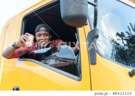 Smile Confidence Young Man service Truck Driver In Business Long transport. Smile Confidence Young Man service Truck Driver In Business Long transport. 86412124